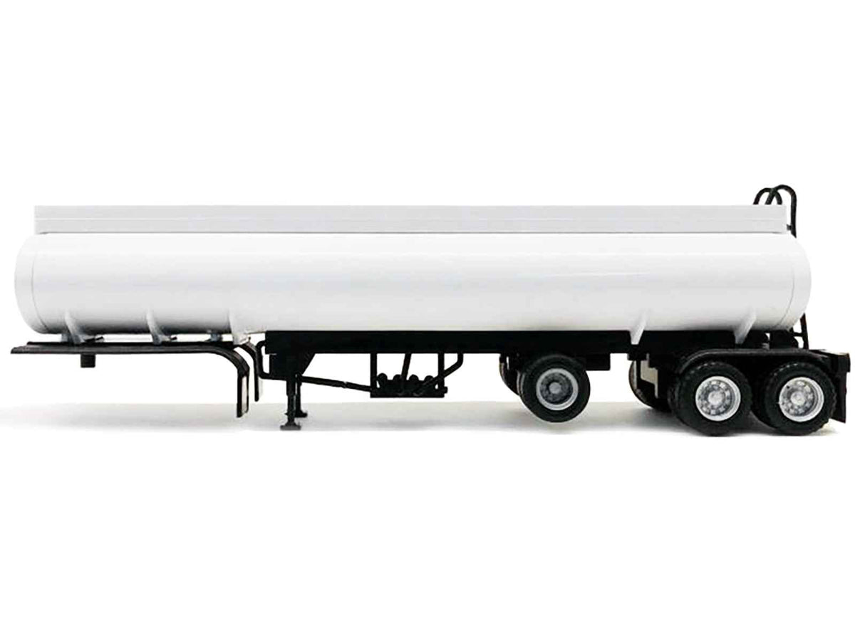 White Tag-Axle Elliptical Tanker Trailer HO scale plastic model by Miniature Motors, detailed miniature accessory for model layouts.
