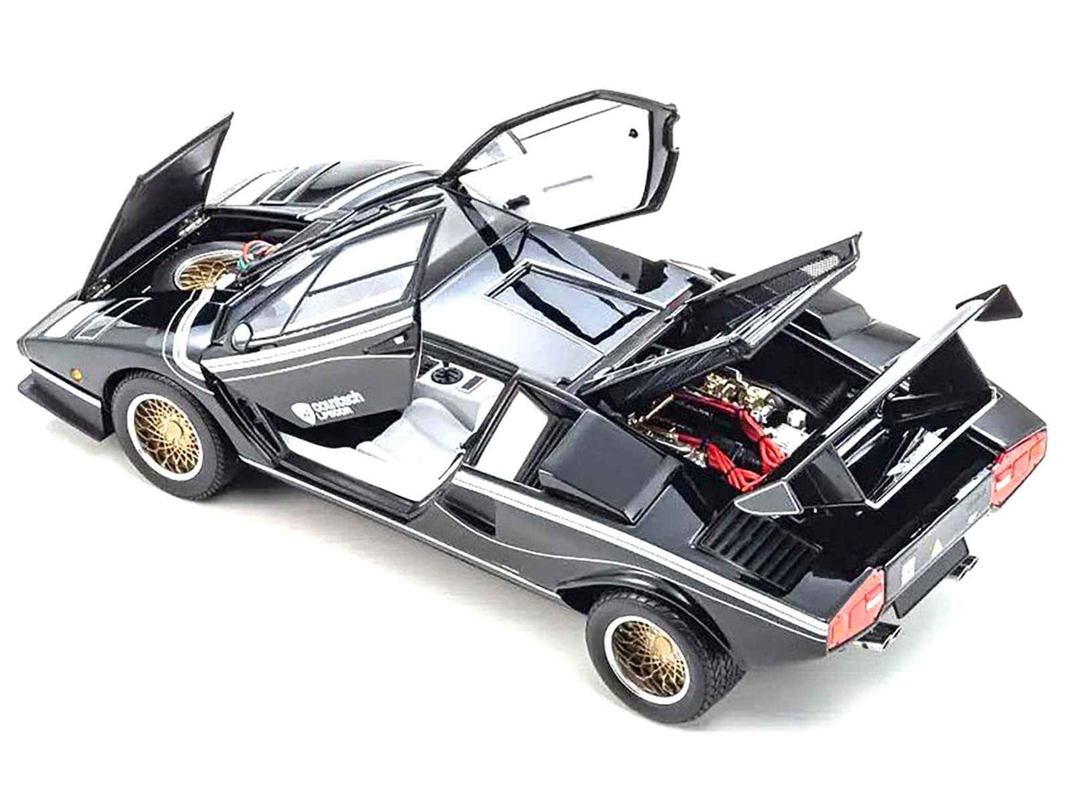 Black Lamborghini Countach LP 500R diecast model car with white interior by Kyosho, detailed 1/18 scale Lamborghini model.