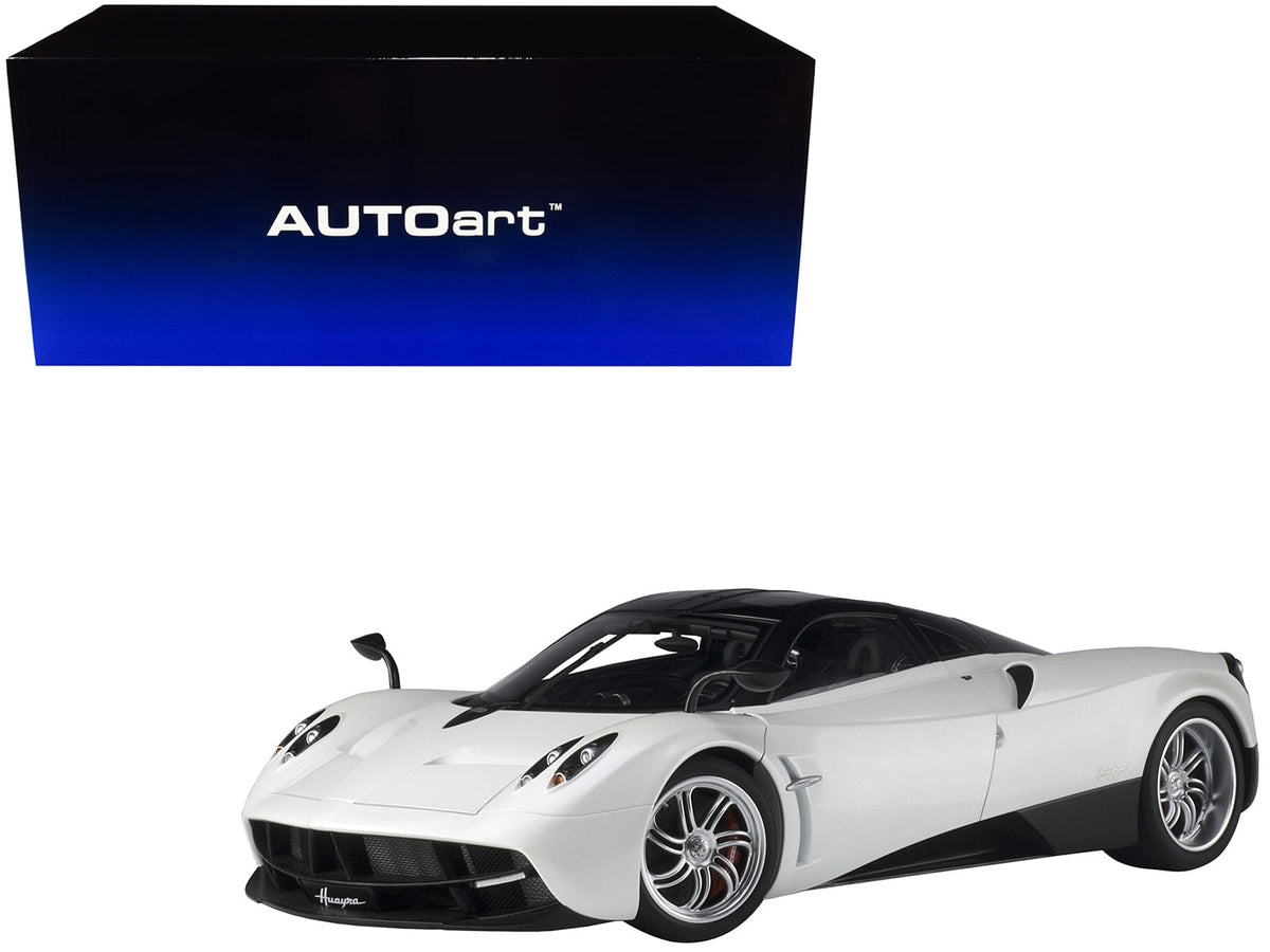 White Pagani Huayra 1/12 scale model car by Autoart, detailed miniature Pagani model from Miniature Motors.