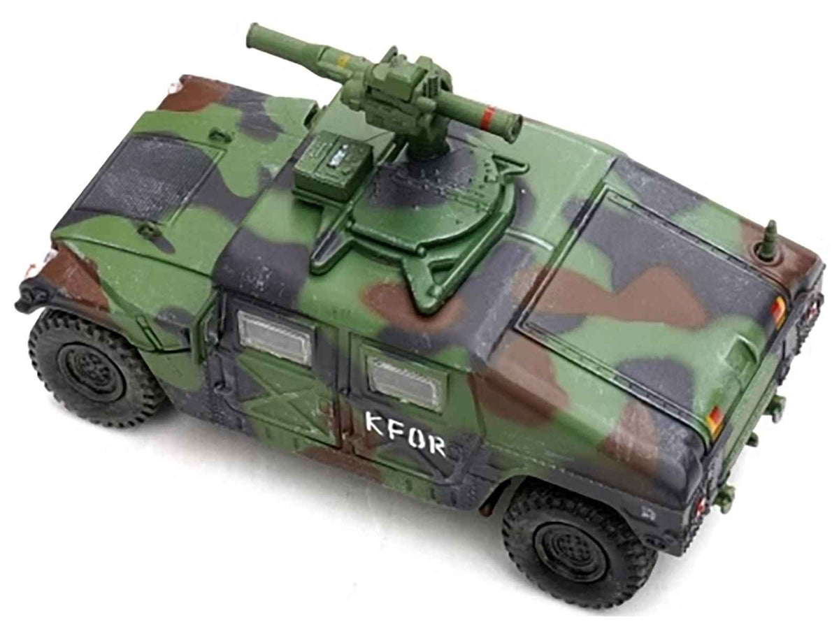 Miniature Motors 1/64 diecast model of M1046 HUMVEE Tow missile carrier in green camouflage, military miniature series.