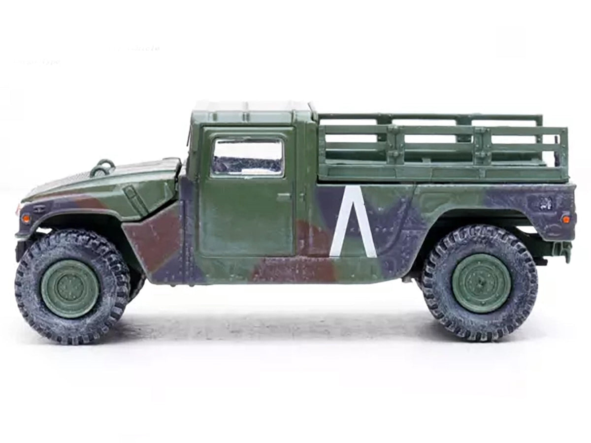 Miniature Motors 1/64 diecast model of M998 HMMWV with 8th Battalion 4th Air Defense Regiment markings, military miniature series.