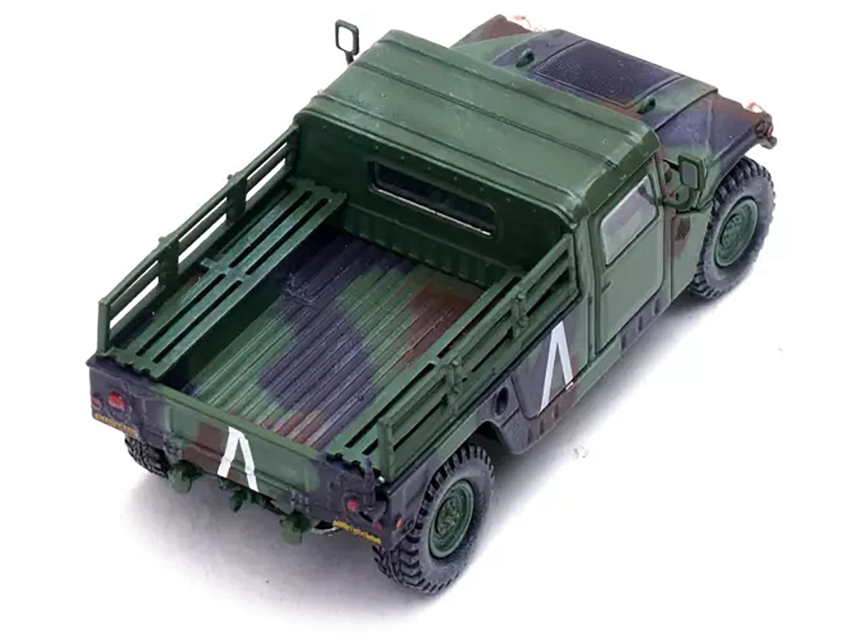 Miniature Motors 1/64 diecast model of M998 HMMWV military vehicle with 8th Battalion 4th Air Defense Regiment markings, Gulf War era