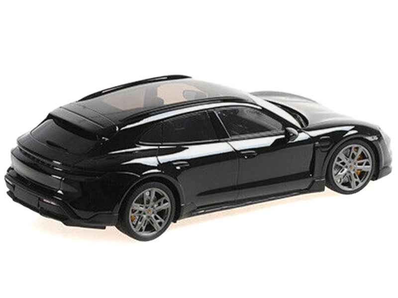 Miniature Motors 2021 Porsche Taycan Turbo S black diecast model car, limited edition 1/18 scale by Minichamps, detailed collectible.