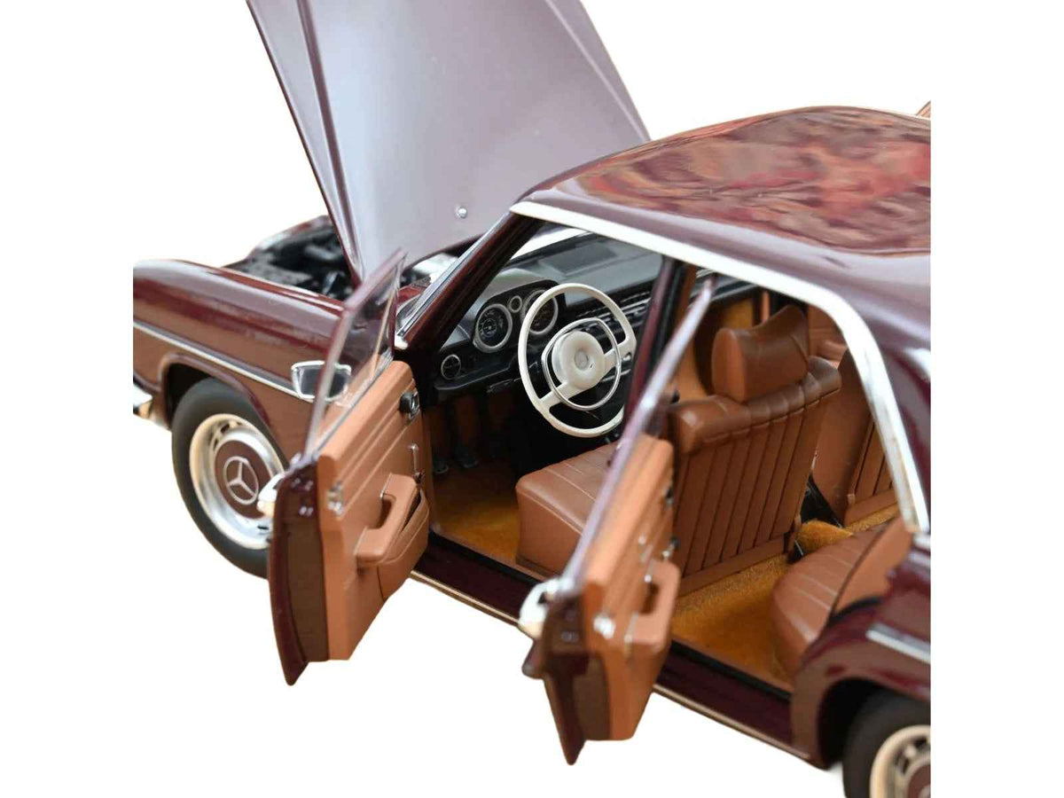 Dark red-brown 1/18 scale Mercedes-Benz 200 diecast model car by Norev, detailed miniature vehicle from Mercedes models collection.