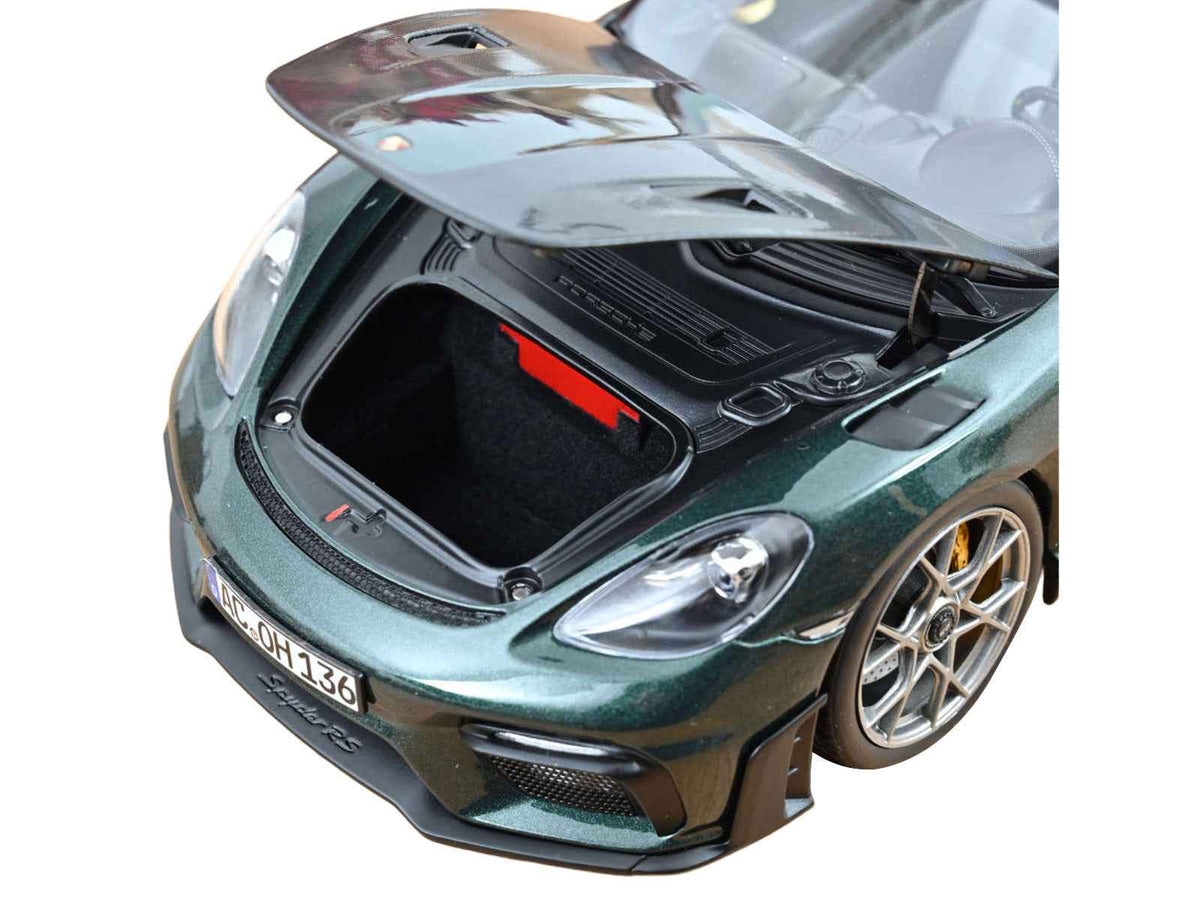 Miniature Porsche 718 Spyder RS Weissach Pack diecast model car in Forest Green metallic with carbon hood stripes, 1/18 scale by Norev.