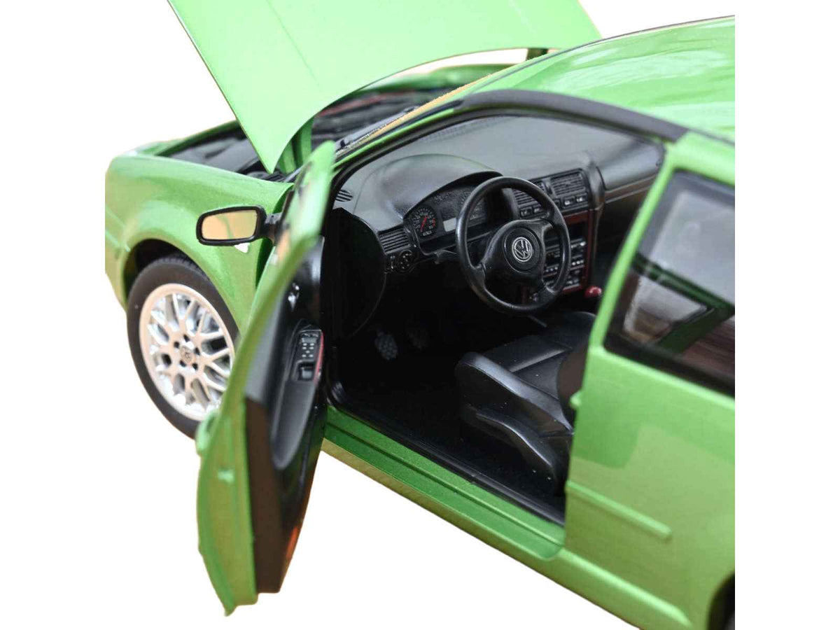 1998 Volkswagen Golf GTI green metallic 1/18 diecast model car by Norev, detailed miniature Volkswagen vehicle.