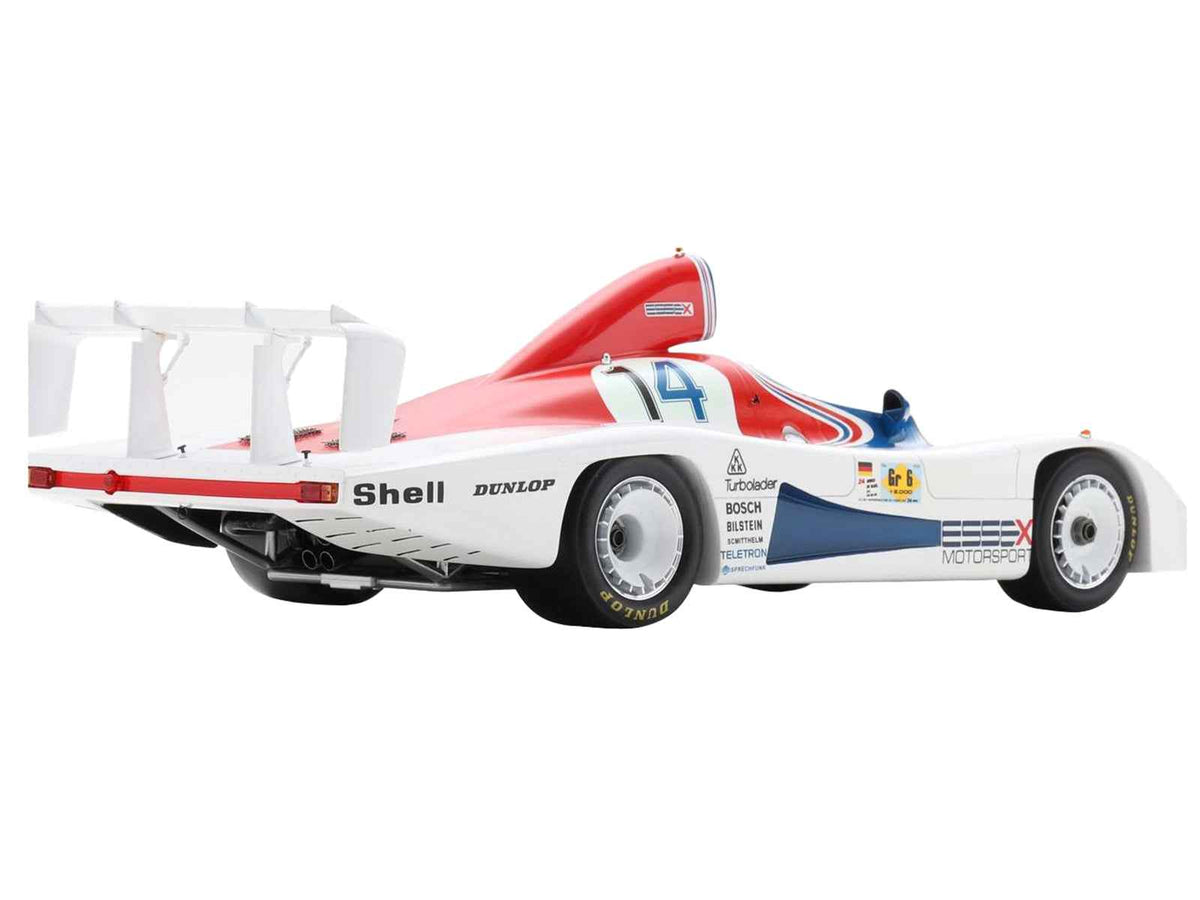 Miniature Motors 1/18 Porsche 936 #14 Bob Wollek Hurley Haywood Le Mans model car with acrylic display case.