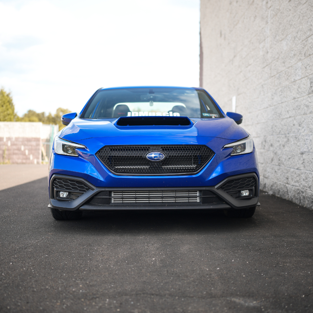 JDMuscle 2022-2025 WRX OEM style customizable sport grille, metal construction with sleek design for Subaru WRX front end.