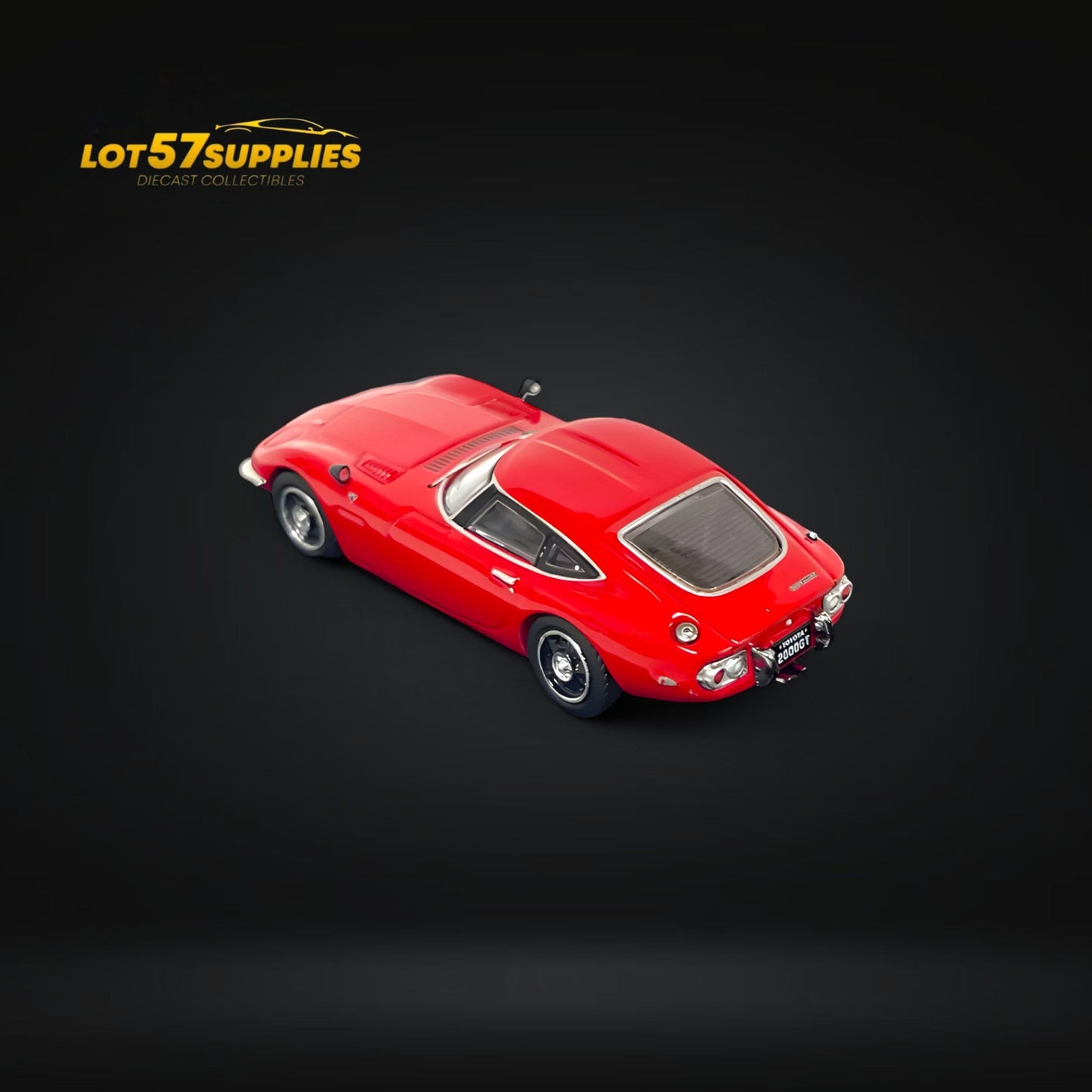 Red Inno64 Toyota 2000GT diecast model, 1:64 scale, detailed replica with sleek design and vibrant finish.