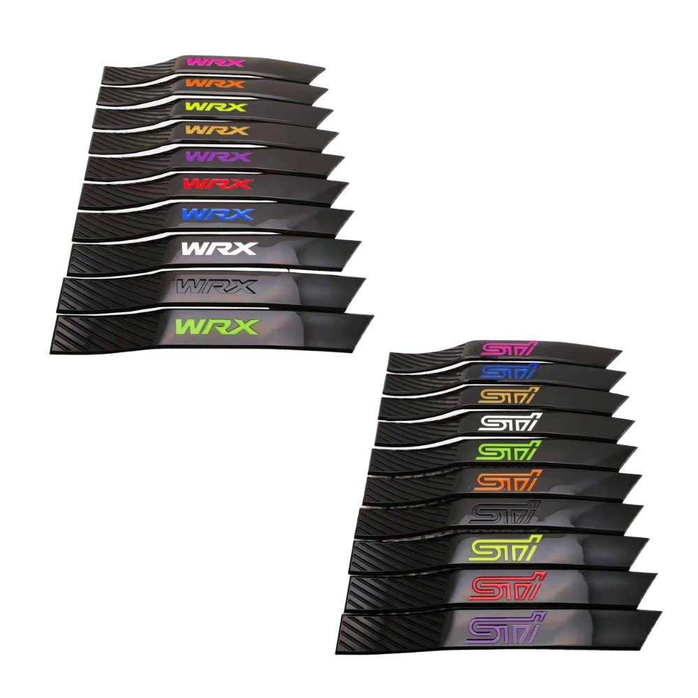 Pair of JDMuscle Racing Art 08-14 Subaru WRX/STI fender emblems, automotive ornaments for sporty styling on Subaru vehicles.