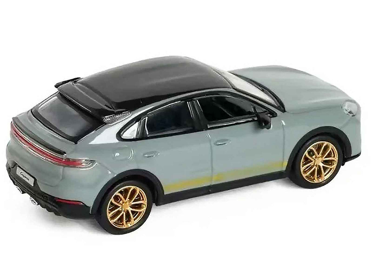 Gray Porsche Cayenne Turbo GT diecast model car by Miniature Motors, featuring black top and gold stripes, 1/64 scale.