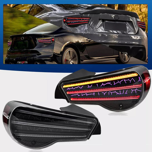 Pair of Toyota 86 Subaru Brz Scion FRS tail lights by NTXGlow, showing the red and clear lens design on a white background.