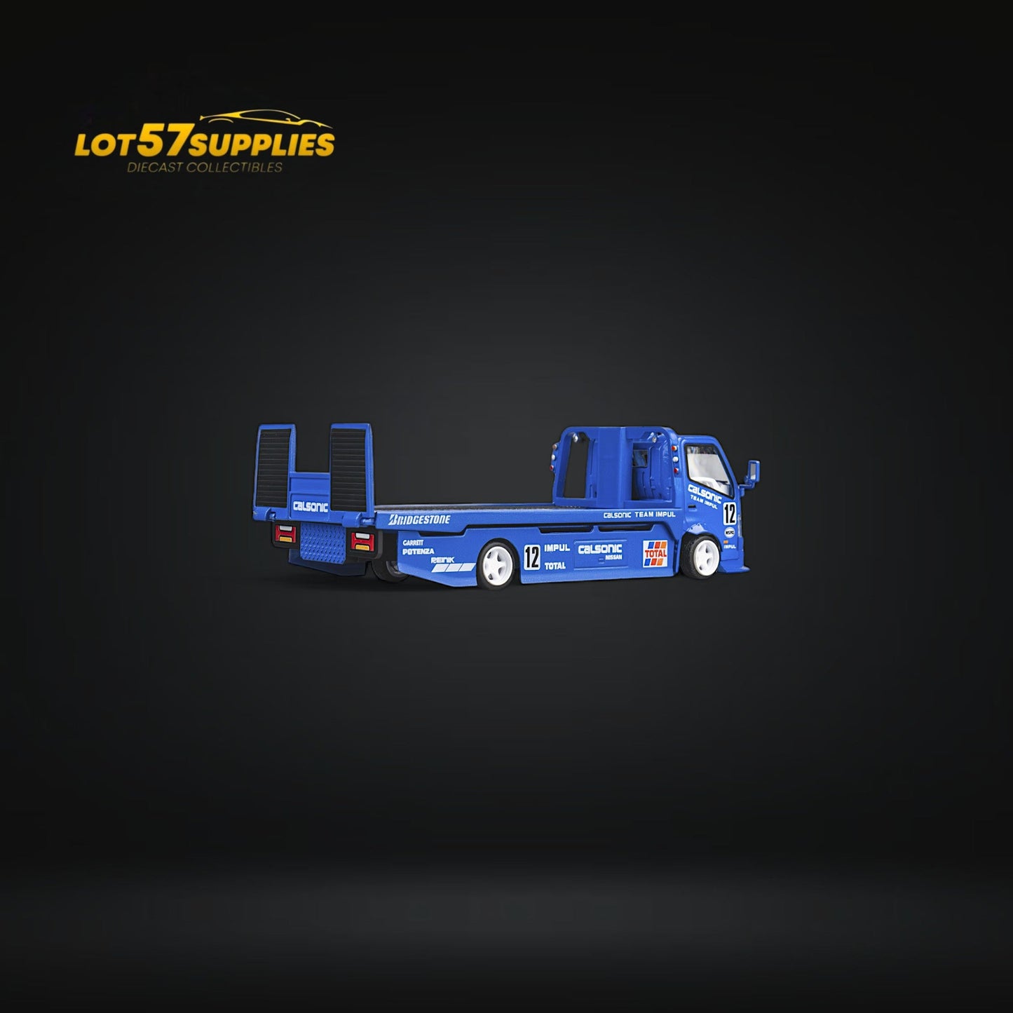 Blue HINO 300 MicroTurbo diecast truck with Calsonic livery, detailed 1:64 scale model featuring flatbed design and custom paint.