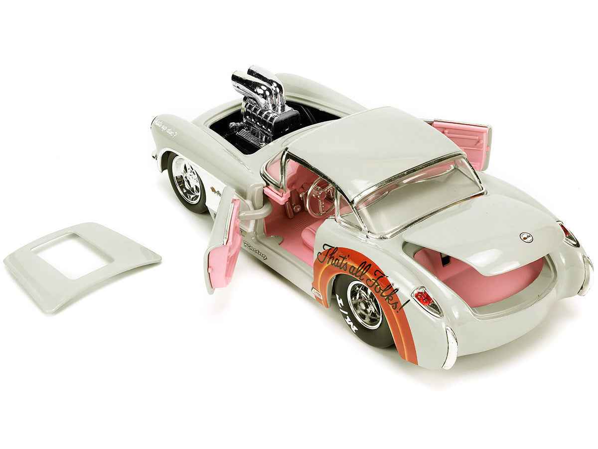 1957 Chevrolet Corvette model by Miniature Motors, beige with pink interior and Bugs Bunny figure, part of Looney Tunes Hollywood Rides series.
