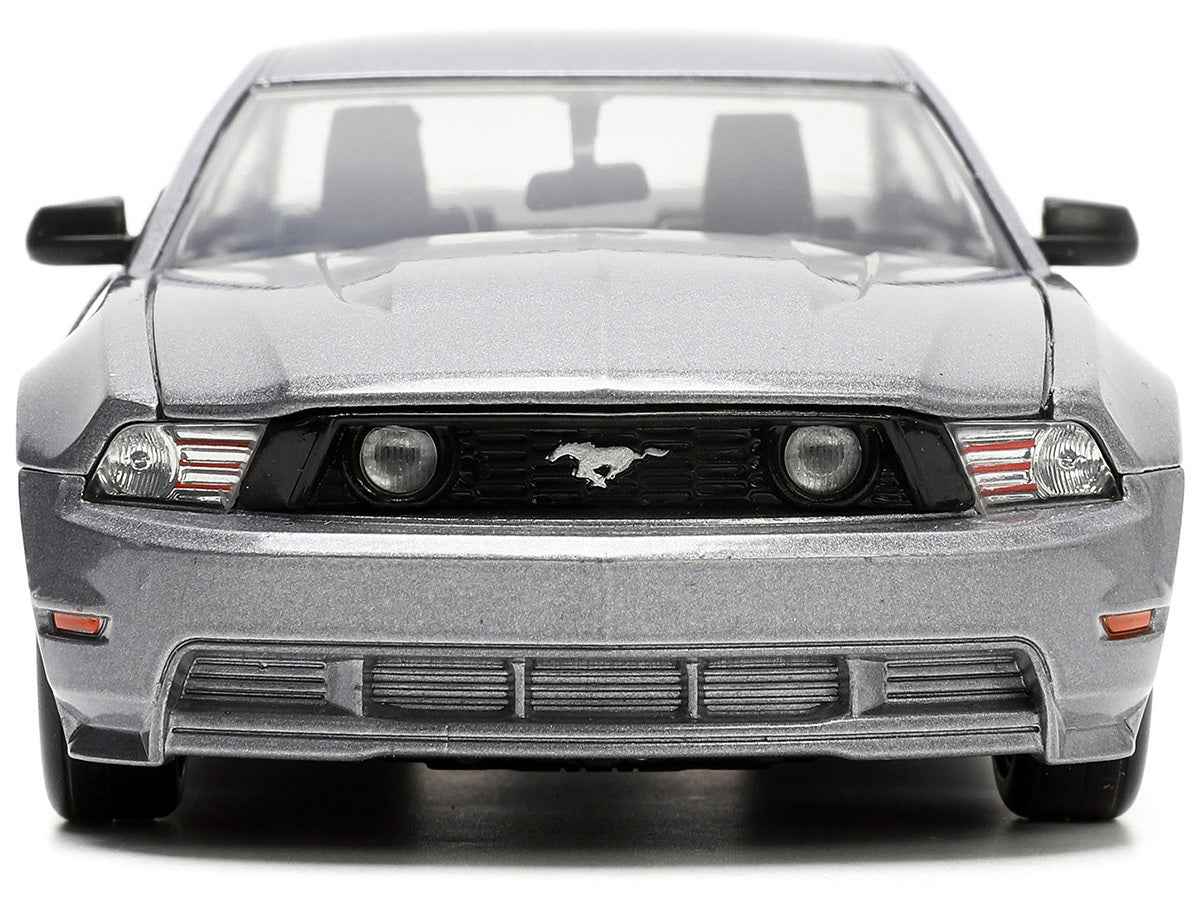 2010 Ford Mustang GT gray metallic diecast model car with flame decals, part of Jada's Bigtime Muscle series, by Miniature Motors