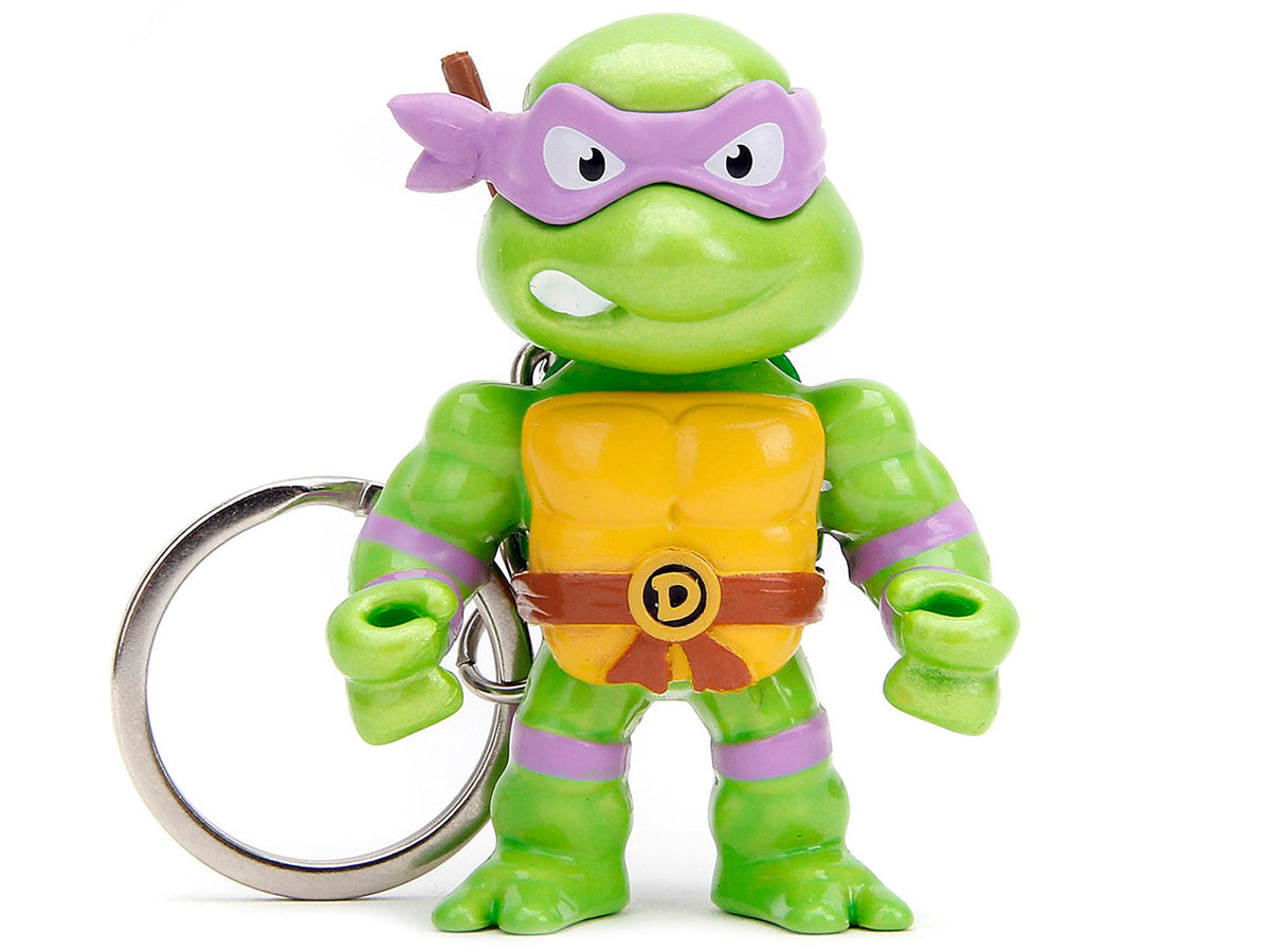 Set of 4 Teenage Mutant Ninja Turtles diecast figure key chains by Jada Metalfigs, featuring detailed TMNT character models.