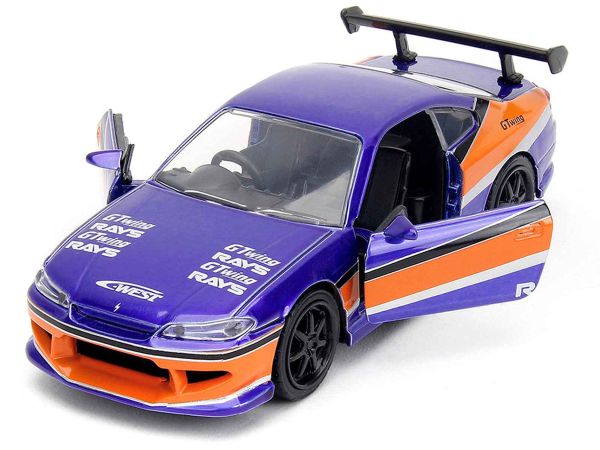 Blue metallic 2001 Nissan Silvia S15 RHD diecast model with "The Fast and the Furious" graphics, by Miniature Motors, scale 1/32.