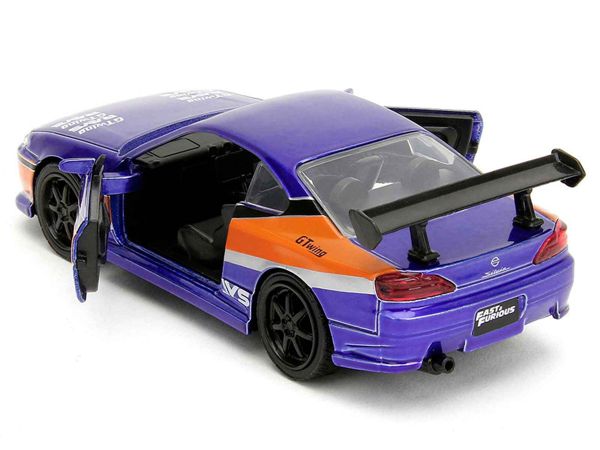 Blue metallic 2001 Nissan Silvia S15 RHD diecast model by Miniature Motors, featuring "Tokyo Drift" graphics from the Fast & Furious series.