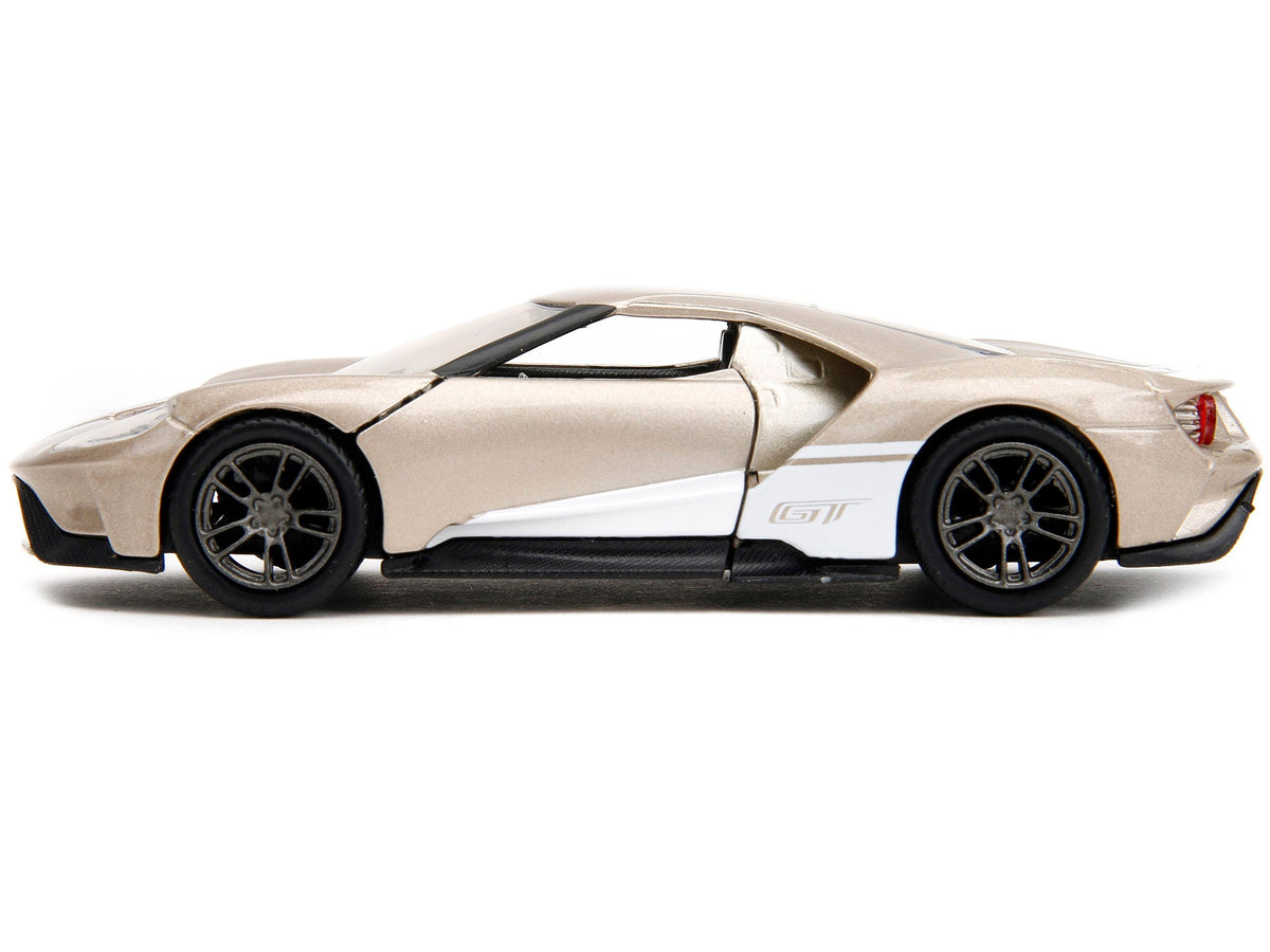 Miniature Ford GT 2017 diecast model car in gold metallic with white accents from Jada's Pink Slips Series, 1/32 scale.