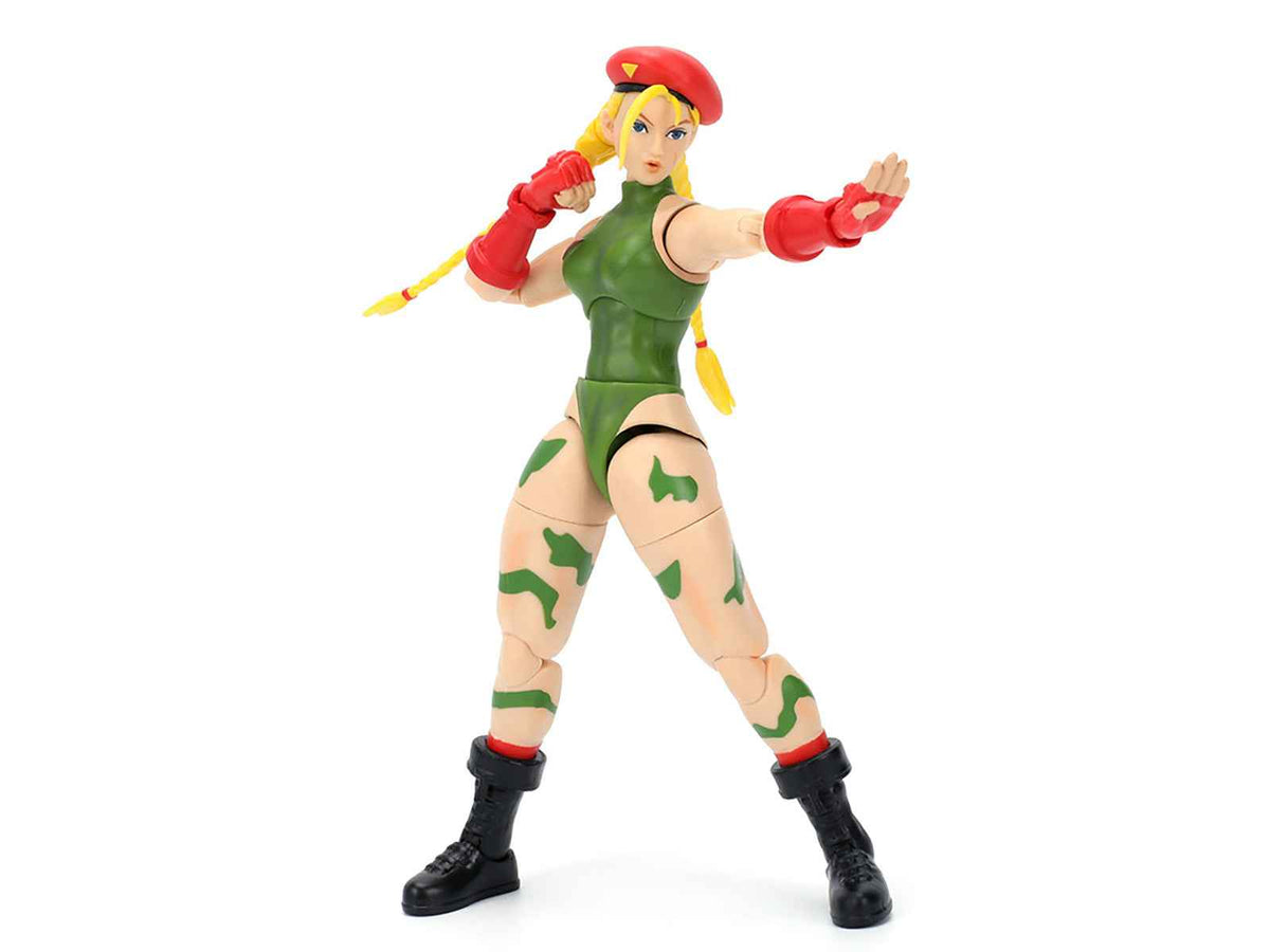 Cammy 6-inch moveable figure from Ultra Street Fighter II with accessories, alternate head and hands, by Miniature Motors.