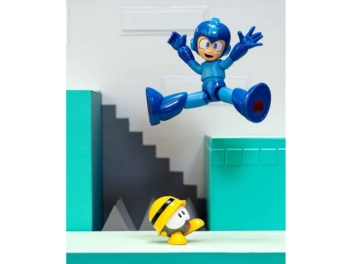 Mega Man 4.5-inch movable figure by Miniature Motors, with accessories, alternate head and hands, based on 1987 video game character.