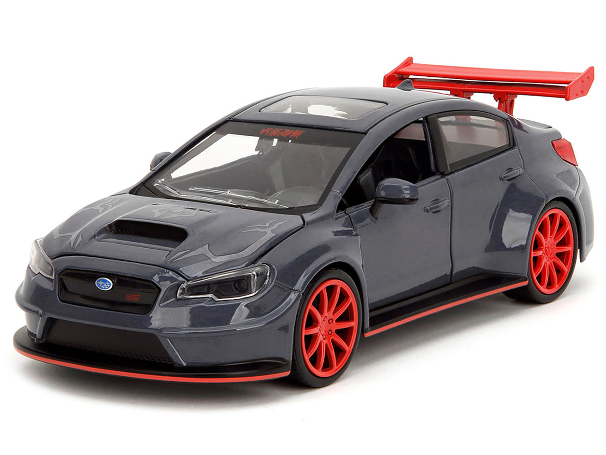 Dark blue 2016 Subaru WRX STI widebody diecast model car by Miniature Motors, featuring Yuji Itadori figure from Jujutsu Kaisen series.