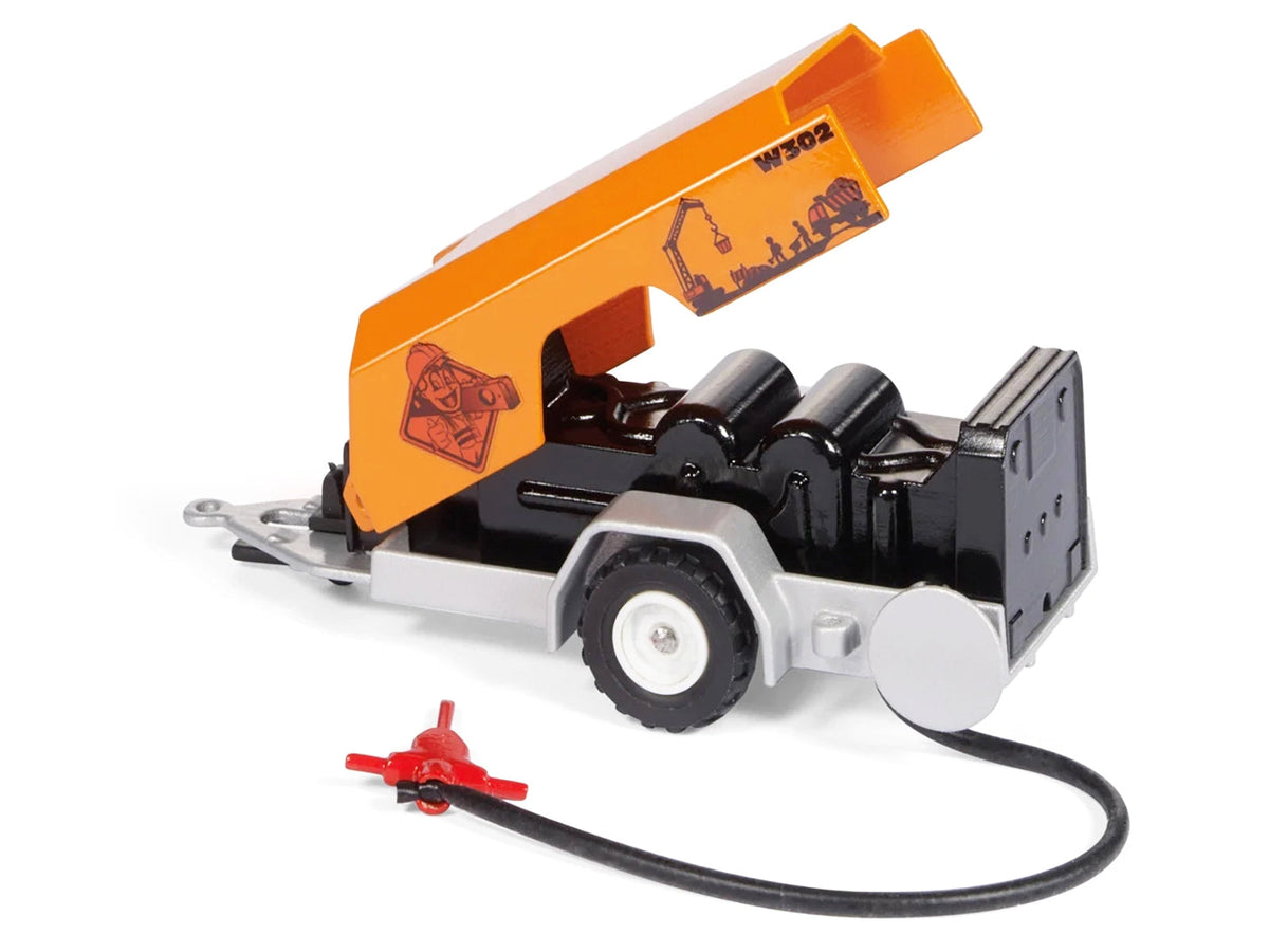 Yellow RAM 1500 pickup truck diecast model with compressor trailer and worker figure, detailed miniature by Miniature Motors.