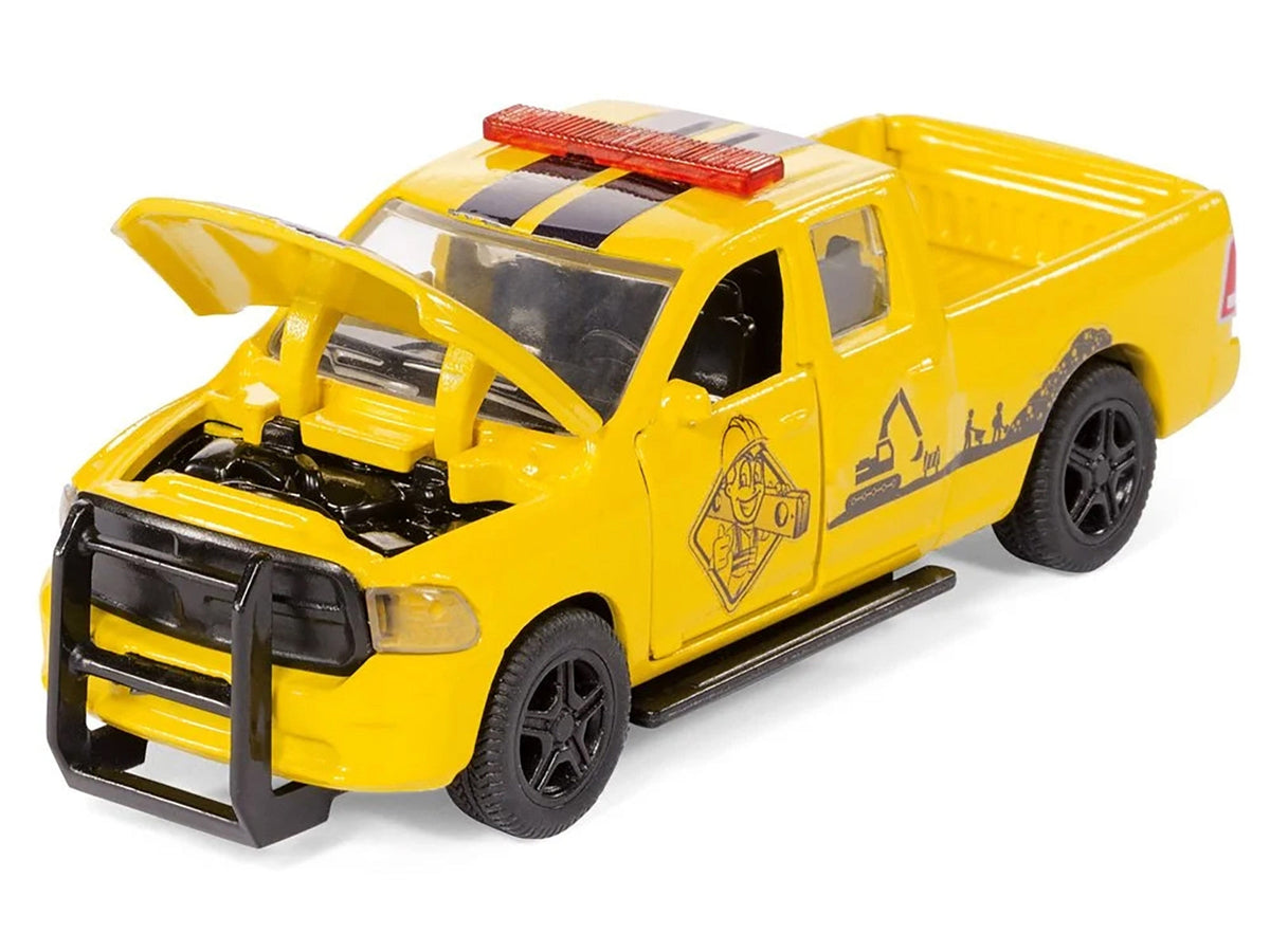 Yellow RAM 1500 pickup truck diecast model with compressor trailer, worker figure, and accessories from Miniature Motors’ RAM Models set.