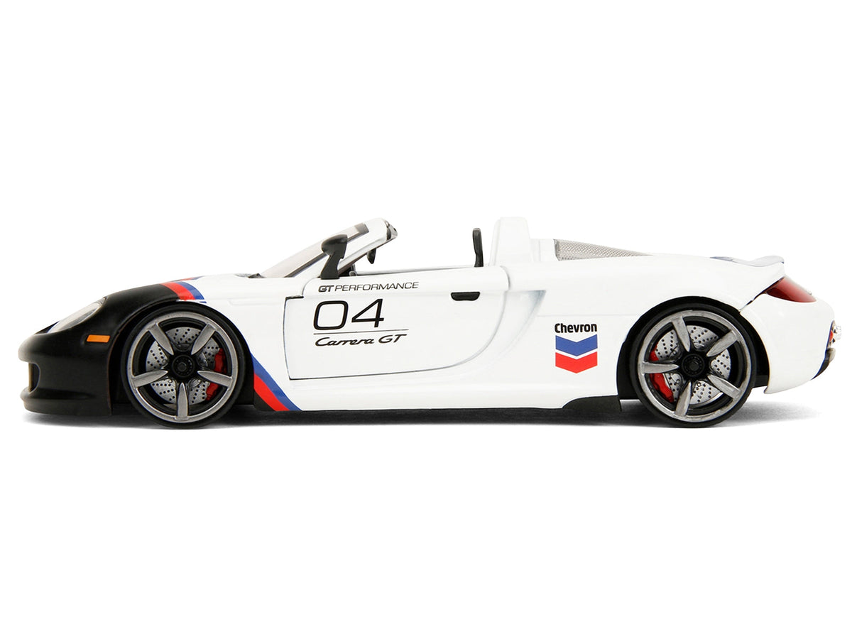 White Porsche Carrera GT convertible diecast model car by Miniature Motors, featuring Chevron graphics, Hyper-Spec Series 1/24.