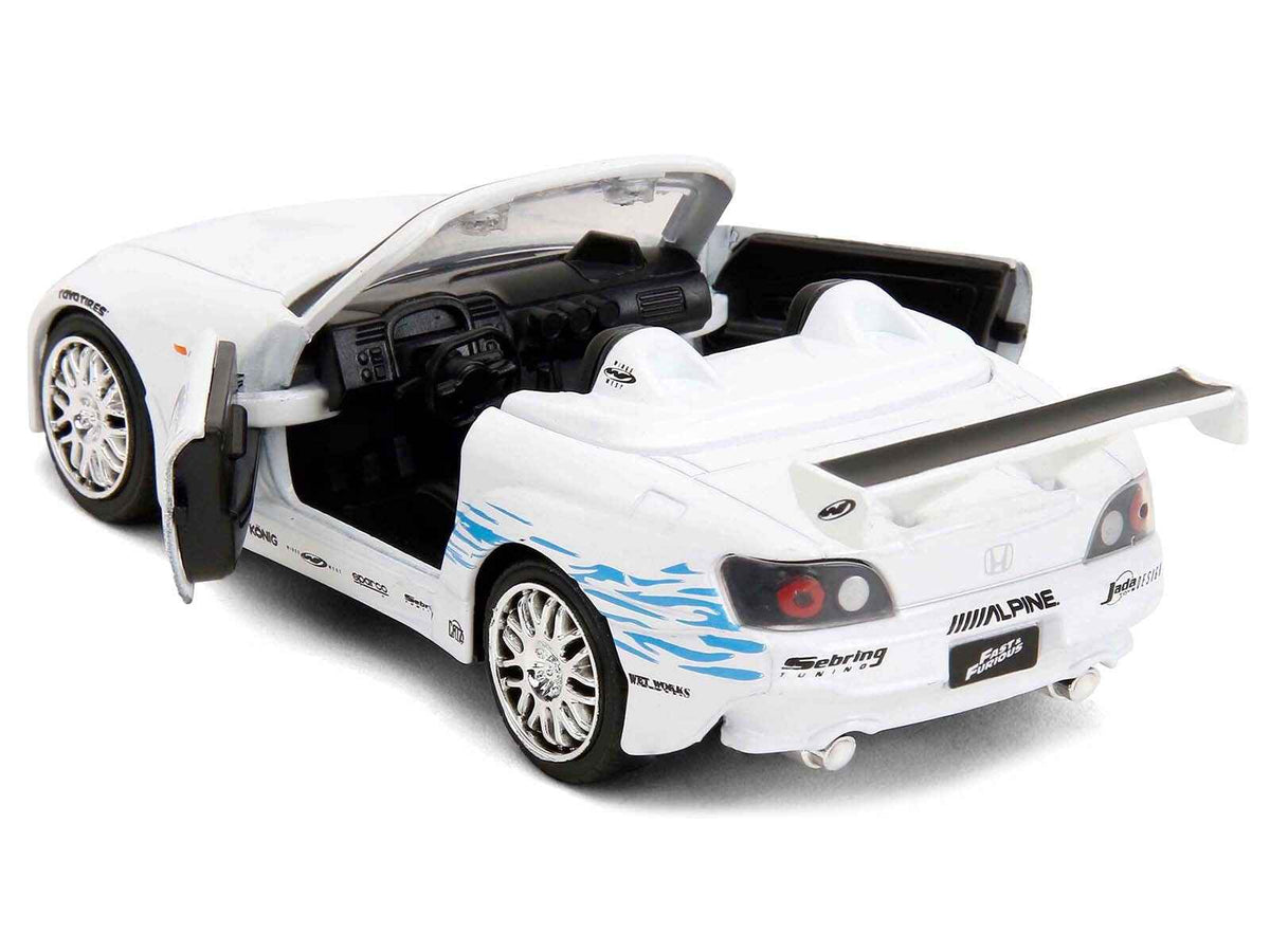 White 2001 Honda S2000 convertible diecast model car with "Fast & Furious Remix" graphics, part of Miniature Motors' series.