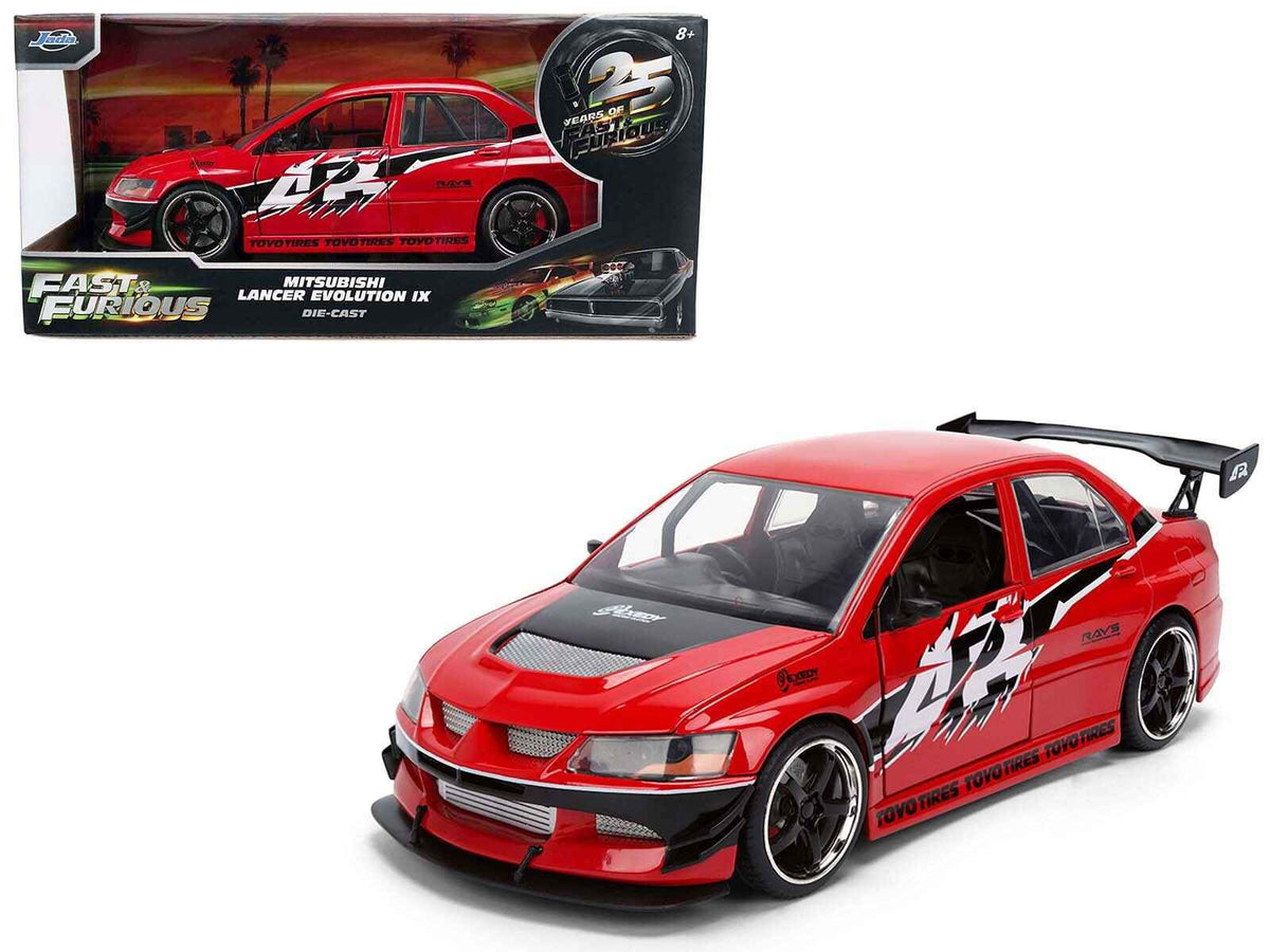 Red Mitsubishi Lancer Evolution IX RHD diecast model car from the Fast & Furious Tokyo Drift series, by Miniature Motors.