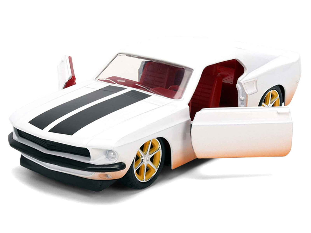 White Ford Mustang diecast model car with black stripes and red interior from the Fast & Furious 25th Anniversary series by Jada.