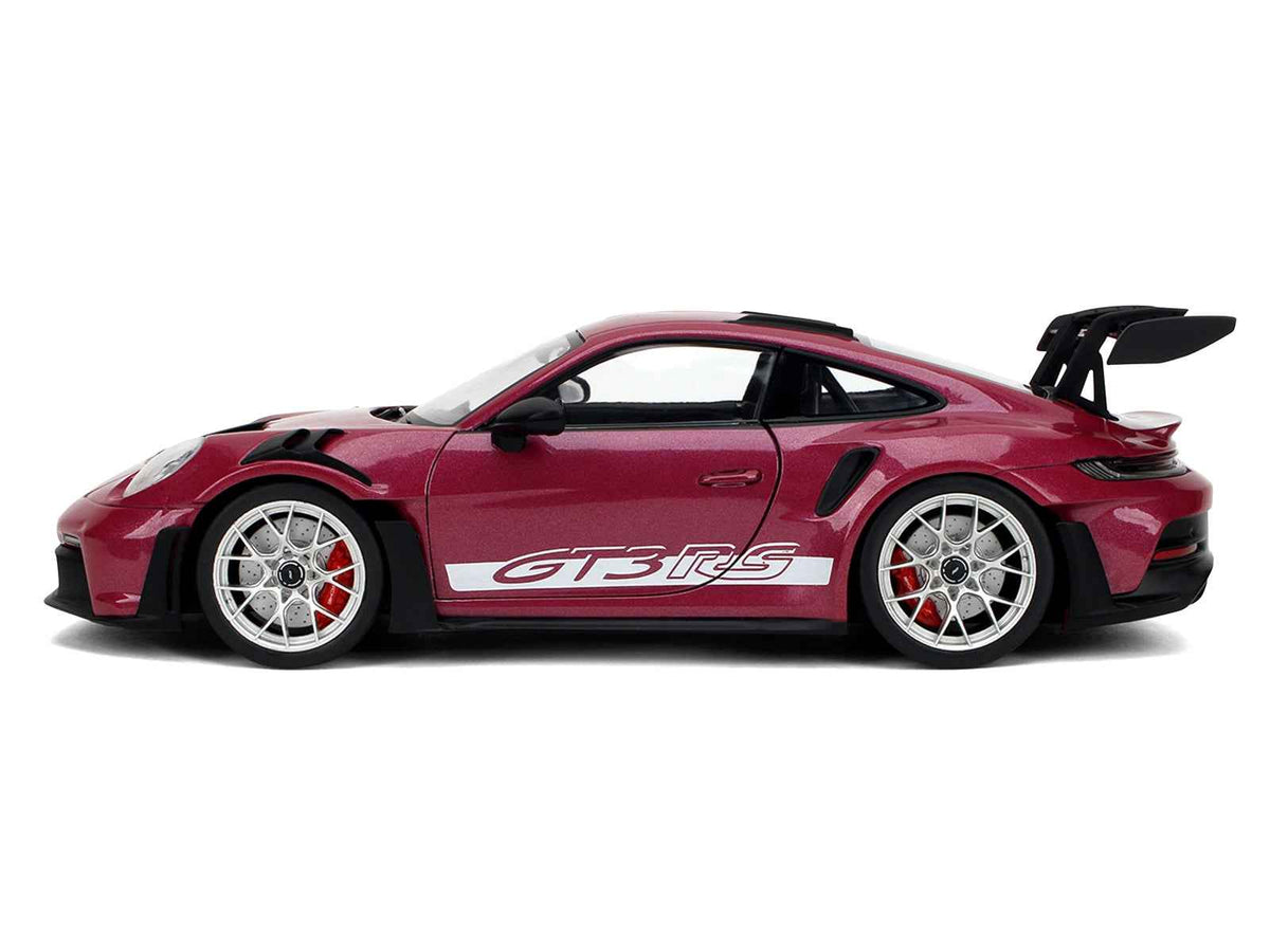 Red violet metallic Porsche 911 GT3 RS diecast model car with white stripes, part of Miniature Motors' Jada Pink Slips Series, 1/18 scale.