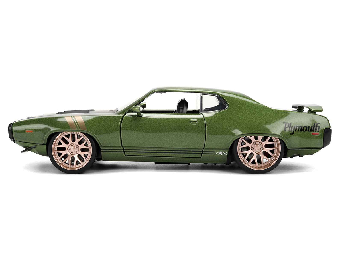 Miniature Motors 1/24 diecast Plymouth GTX model car in green metallic with black hood and gold stripes, detailed "Bigtime Muscle" series.