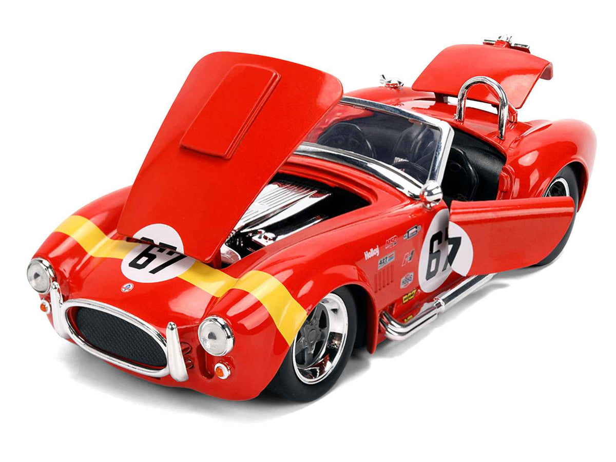 Red 1965 Shelby Cobra 427 S/C diecast model car with yellow stripe, Miniature Motors Shelby Models series by Jada, detailed scale replica