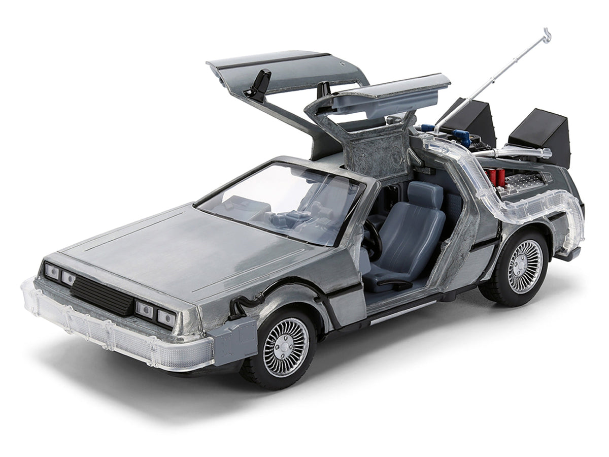 Miniature Motors DeLorean brushed metal time machine model from Back to the Future with lights, in special anniversary packaging.