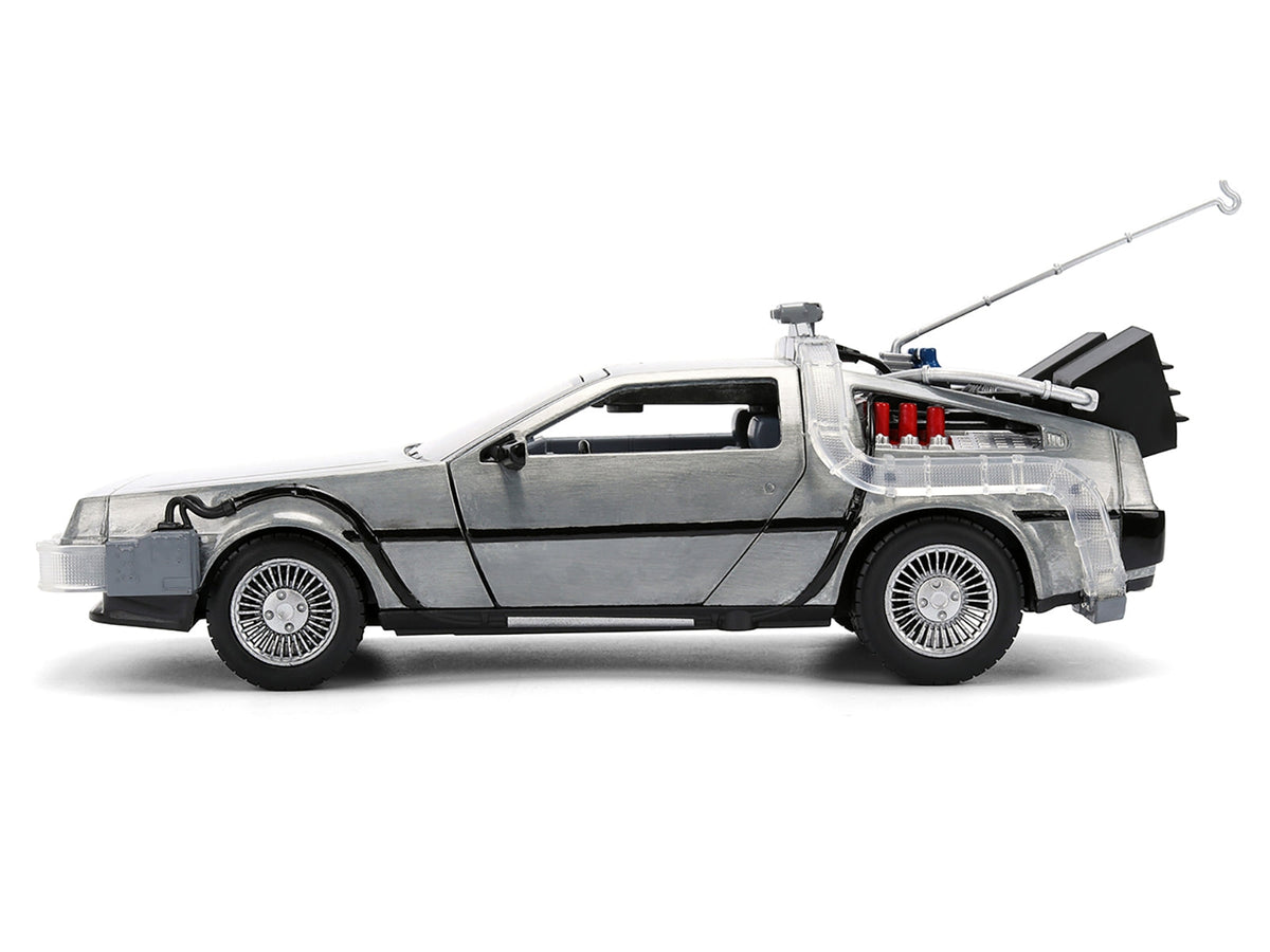 Brushed metal DeLorean time machine diecast model car with lights from Back to the Future, 40th anniversary, by Miniature Motors.