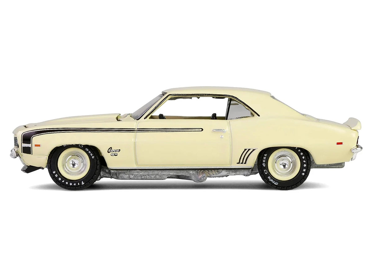 Miniature Motors 1969 Chevrolet Camaro SS 396 diecast model in Butternut Yellow with black stripes, part of the Barrett-Jackson series.