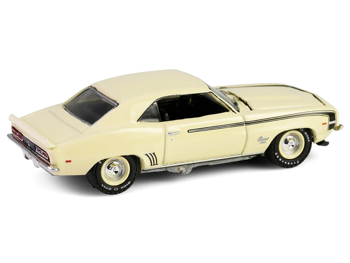 Miniature Motors 1969 Chevrolet Camaro SS 396 Butternut Yellow diecast model car with black stripes, part of the Barrett-Jackson Series.