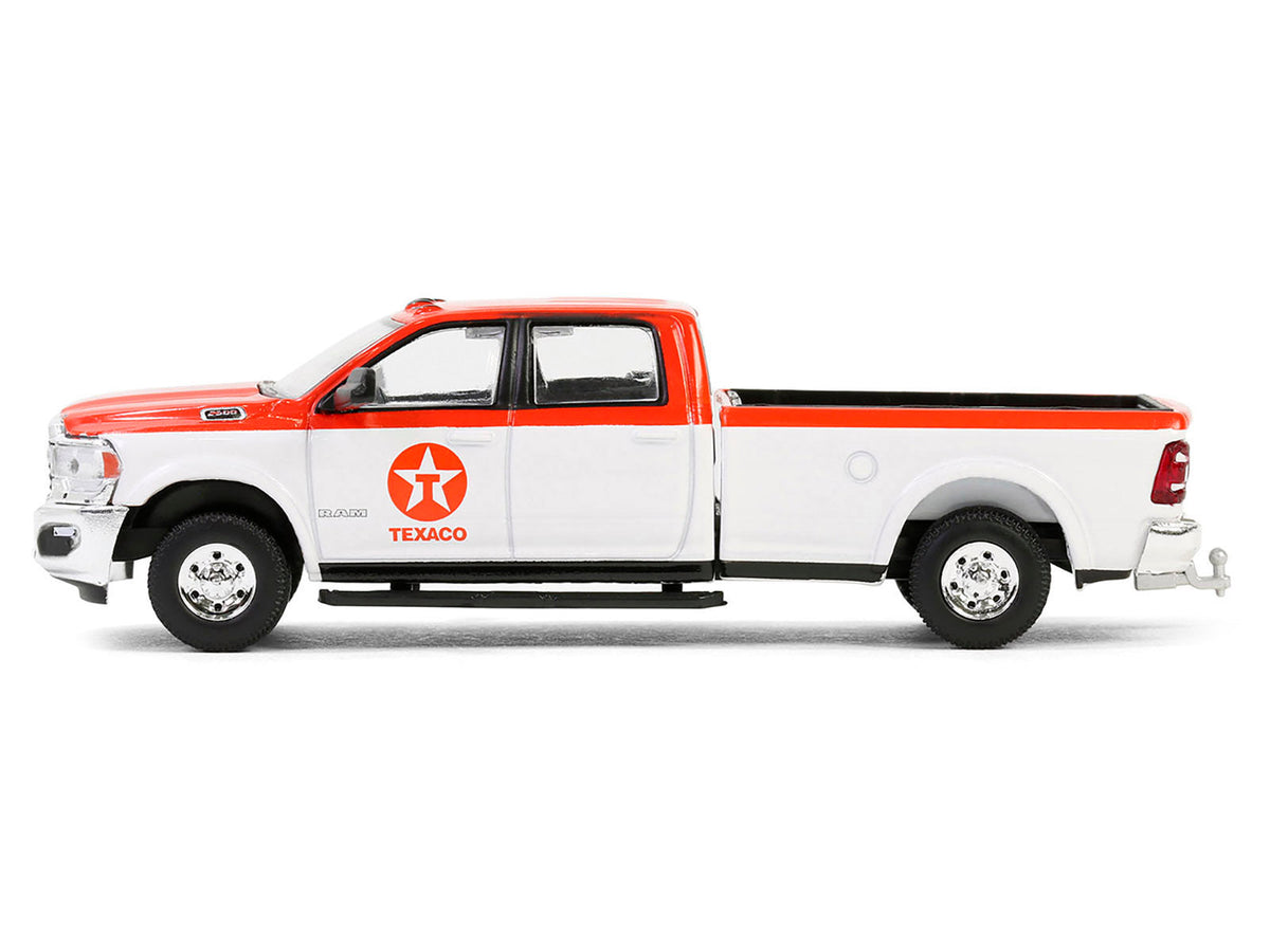 Miniature 1:64 scale Ram 2500 Pickup Truck diecast model by Greenlight, orange and white Texaco Special Edition series.