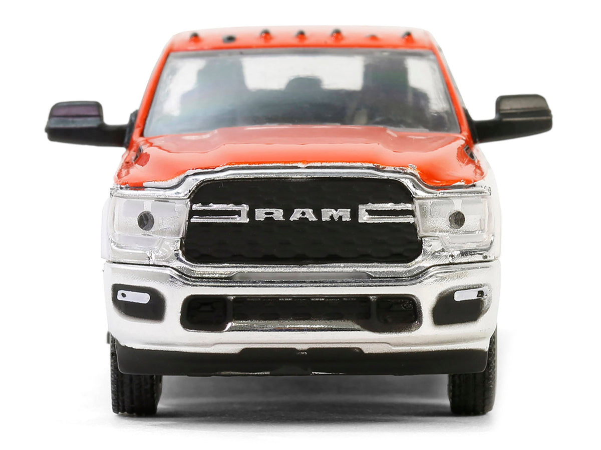 Miniature Motors 2023 Ram 2500 Pickup Truck diecast model in orange and white Texaco Special Edition, detailed Greenlight 1/64 scale.