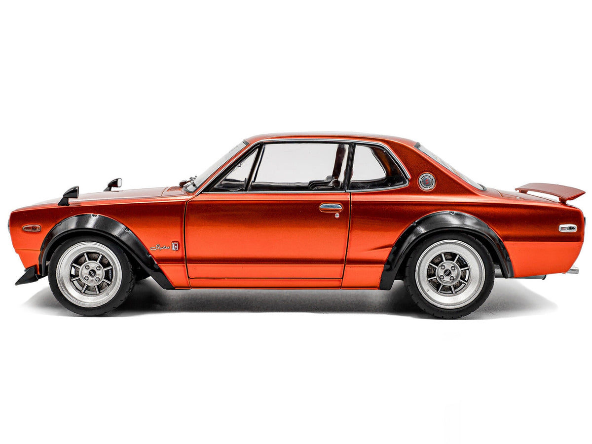 Orange metallic 1970 Nissan Skyline C10 Hakosuka diecast model car by Solido, RHD, 1/18 scale, detailed Nissan model from Miniature Motors