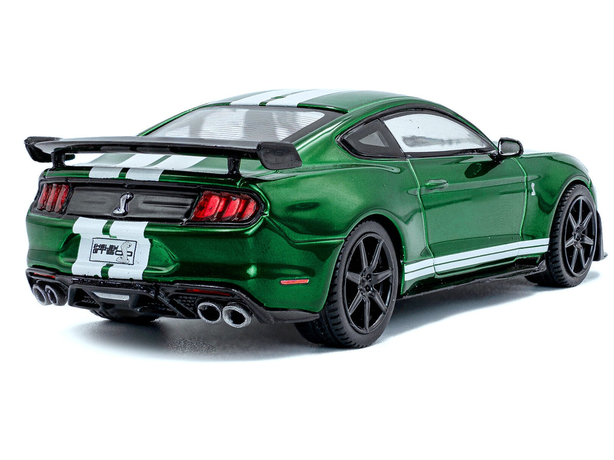 Miniature Ford Mustang Shelby GT500 diecast model in Eruption Green Metallic with white stripes, 1/43 scale by Solido.