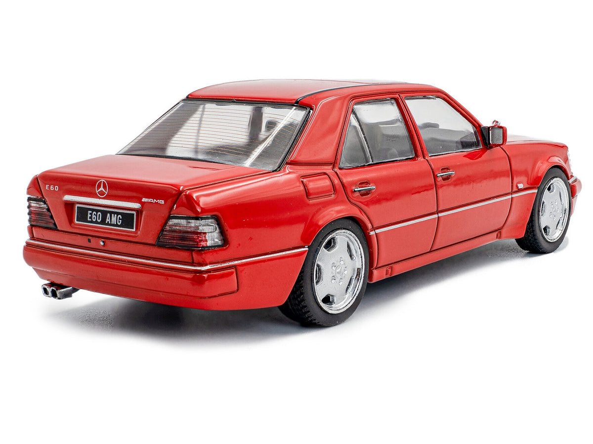 Miniature Motors 1994 Mercedes-Benz W124 E60 AMG Signal Red 1/43 diecast model car by Solido, detailed collectible vehicle.