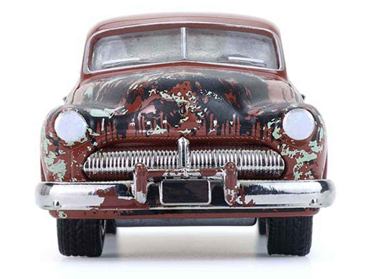 Miniature Motors 1949 Mercury Eight "Barn Find" diecast model in rusted brown from Greenlight's Series 11, detailed farm find replica.