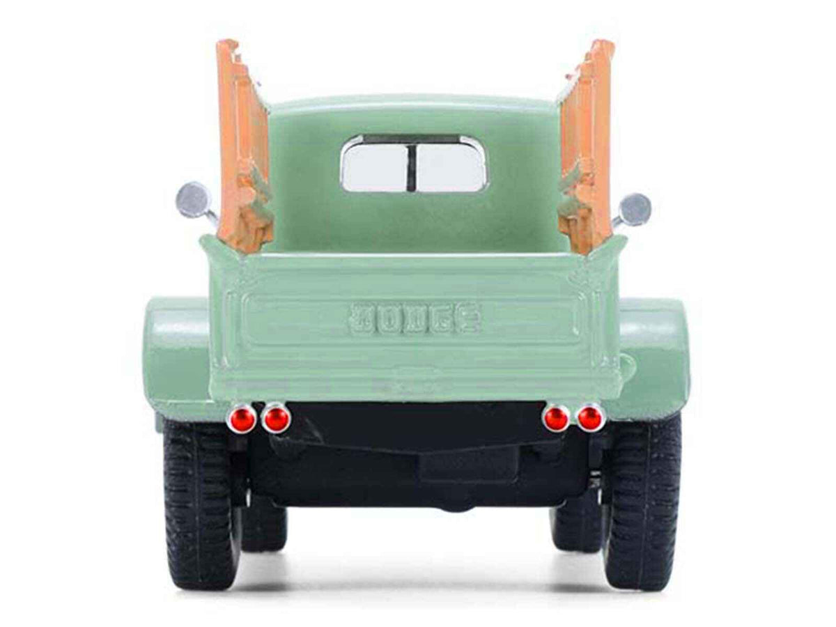 Miniature Motors 1/64 Dodge Power Wagon Pickup Truck diecast model in green from the "Down on the Farm" series, detailed farm vehicle replica.