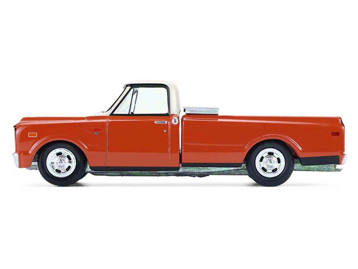 Miniature Motors 1968 Chevrolet C-10 pickup diecast model in orange and beige from the "Down on the Farm" series, 1/64 scale.