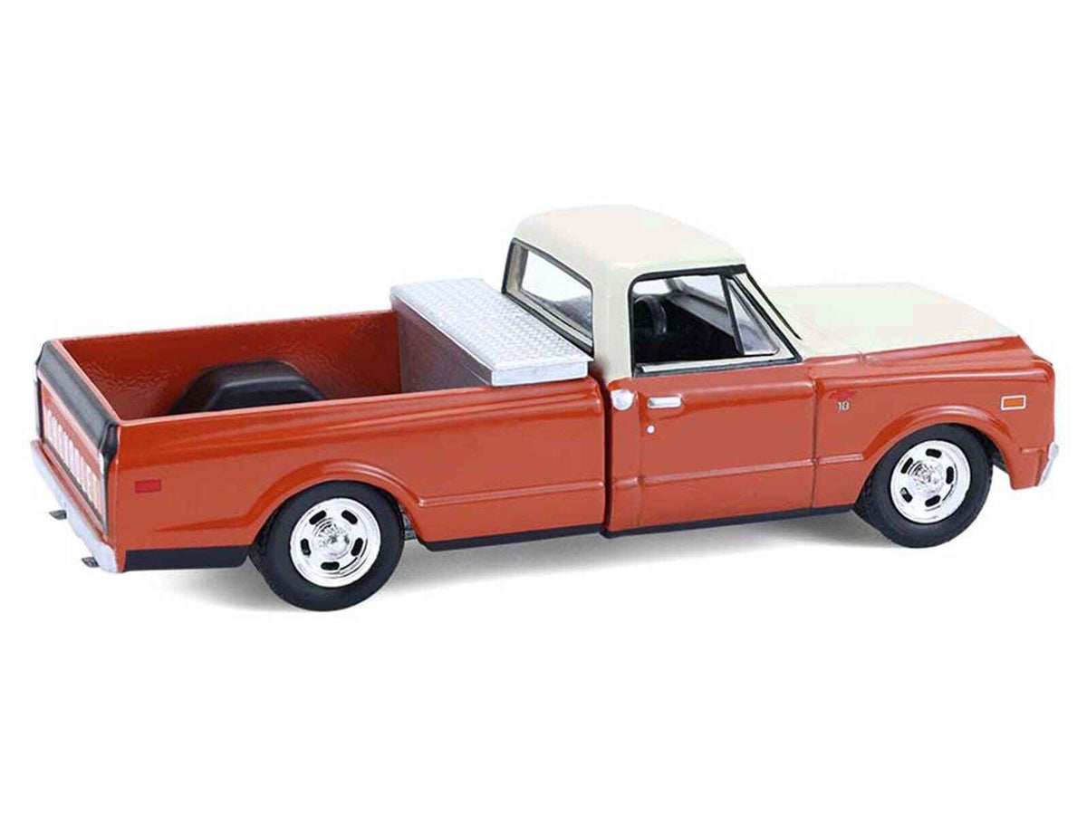 Miniature Motors 1968 Chevrolet C-10 pickup diecast model in orange and beige from the "Down on the Farm" series, 1/64 scale.
