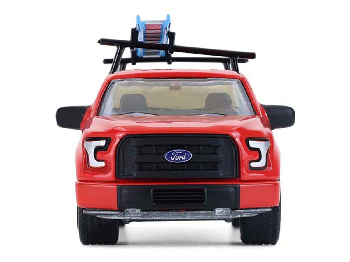 Red 2015 Ford F-150 pickup truck diecast model with ladder rack and black stripes, part of the "Down on the Farm" series by Greenlight.