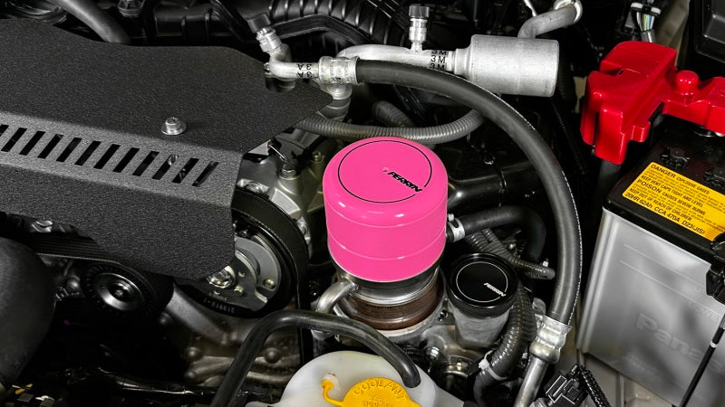 JDMuscle Perrin hyper pink oil filter cover for Subaru WRX, BRZ, and Toyota GR86 engine oil caps, with a sleek vibrant pink finish.